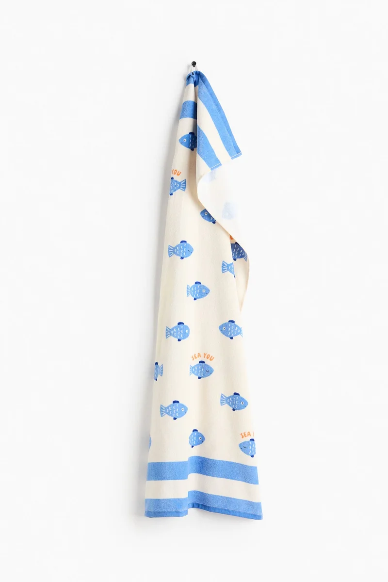 اتش اند ام منشفة للحمام مزينة بنقوش